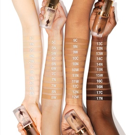 Charlotte Tilbury Airbrush Flawless Foundation shade range shown across four arms with varying skin tones, numbered 1C to 17N