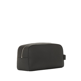 Calvin Klein Foil Logo Wash Bag in black grained leather with silver zip closure, compact rectangular shape, side carry handle visible.