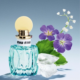 Miu Miu L'Eau Bleue Eau de Parfum 30ml in aqua blue faceted bottle with gold collar, styled with purple florals and ice