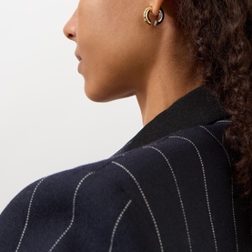 Interlock Huggie Hoop Earrings