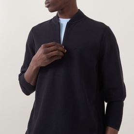 Model wearing Boss Green Label Terrace Logo Half-Zip Sweatshirt in dark blue, styled over a white crew neck tee