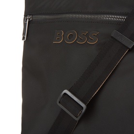 Hugo Boss Catch 3.0 Envelope Crossbody Bag in black, textured finish with embossed logo lettering and woven striped crossbody strap