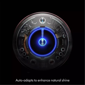 Dyson Supersonic Nural Hair Dryer close-up of glowing blue sensor lens, showing auto-adapt technology to enhance natural shine