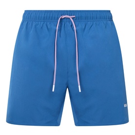 Hugo Boss blue swim shorts with elasticated waistband, contrast lilac drawstring, and small logo patch at hem.