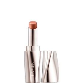 LA MER Lip Balm Treatment in Honey, 3.4g nude-toned bullet with rose gold metal case, cap removed to side