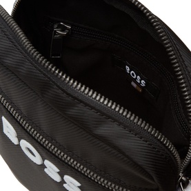 Hugo Boss black crossbody bag, open view showing quilted exterior with white BOSS logo and black polyester interior lining