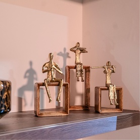 Flute Player Sculpture