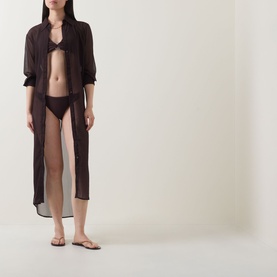 Model wearing Jets Chocolate Bikini Brief with matching sheer cover-up and flip flops