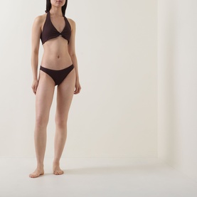 Model wearing Jets chocolate halterneck bikini top with matching bikini briefs