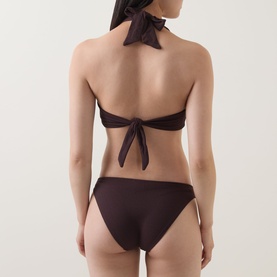 Model wearing Jets chocolate halter-neck bikini top with tie-back detail, styled with matching chocolate bikini bottoms, back view