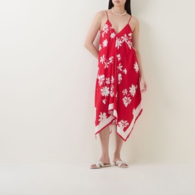Model wearing Seafolly Mayflower Scarf Dress in Cosmo Red, floral print, handkerchief hem, spaghetti straps, styled with pearl necklace and silver