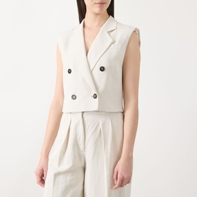 Model wearing Marc O Polo Double-Breasted Cropped Waistcoat in beige, notch lapel, dark buttons, styled with matching wide-leg trousers
