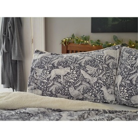 Deyongs Woodland Folk Fleece Duvet Set Grey, featuring fox and foliage print, styled on a bed with matching pillowcases
