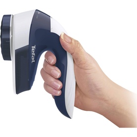 Tefal Fabric Shaver in blue and white, held in hand to demonstrate grip and size of the handheld lint remover device