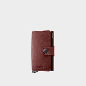 Secrid Basco Ink Leather Miniwallet in brown, Italian vegetable-tanned leather with gunmetal-tone button closure and silver-tone metal lever