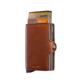 Secrid Texano Twinwallet in brown leather with twin card protectors, shown with cards fanned out, compact size with bronze-tone closure