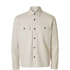 Selected Jackie Regular Overshirt in beige with cut-away collar, dark button fastening, and two buttoned chest patch pockets