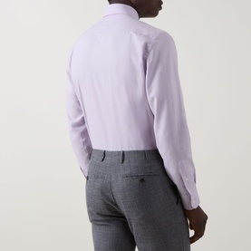 Model wearing a lilac formal dress shirt, rear view, styled with grey tailored trousers