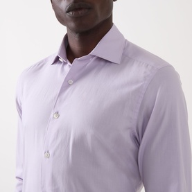 Model wearing a lilac formal shirt with spread collar and button placket, close-up view of collar and chest detail