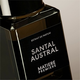 MATIERE PREMIERE Santal Austral Extrait de Parfum 100ml in dark glass bottle with black label, close-up detail shot