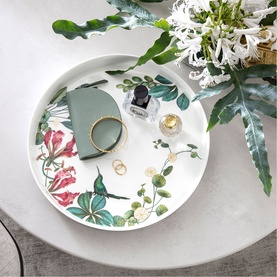 Villeroy & Boch Avarua Gifts Serving Bowl 33cm in bone porcelain with tropical botanical motifs, styled with jewellery and fragrance accessories