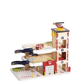 Le Toy Van Fire & Rescue Wooden Garage Playset with multi-level ramps, fire engine, and helicopter in red, white, and blue