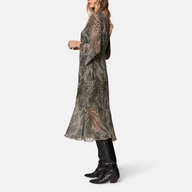 Model wearing Helen McAlinden Ezra Leopard Print Dress in multi, styled with black knee-high boots, side profile view