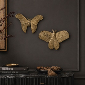 Mindy Browne Butterfly Wall D&eacute;cor Set of Two, gold polystone butterfly and moth wall art mounted on dark grey wall