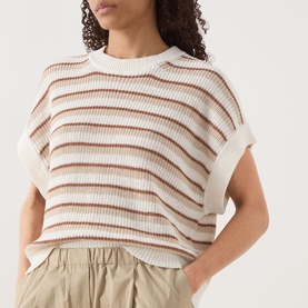 Model wearing Part Two Belisia Striped Sweater in beige with brown stripes, crew neck, dropped shoulders, styled with khaki trousers