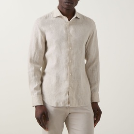 Model wearing Boggi Milano Linen Casual Shirt in sand, featuring pointed collar, long sleeves and button fastenings, styled with matching sand