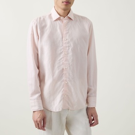 Model wearing Boggi Milano Solid Classic Shirt in light pink linen blend, point collar, long sleeves, styled with white trousers.