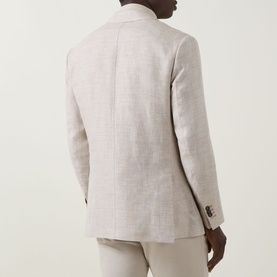 Model wearing Boggi Milano Herringbone Single-Breasted Blazer in sand, showing double-vented back detail in linen-wool blend fabric.