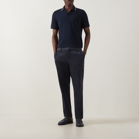 Model wearing Boggi Milano S-Caf&eacute;&reg; Logo Piqu&eacute; Polo Shirt in navy with tipped collar, styled with dark tailored trousers and loafers.