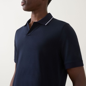 Model wearing Boggi Milano S-Caf&eacute;&reg; Logo Piqu&eacute; Polo Shirt in navy with white tipped collar detail and short sleeves.