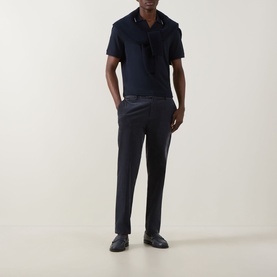Model wearing Boggi Milano S-Caf&eacute;&reg; Logo Piqu&eacute; Polo Shirt in navy with tipped collar detail, styled with navy trousers and dark loafers.