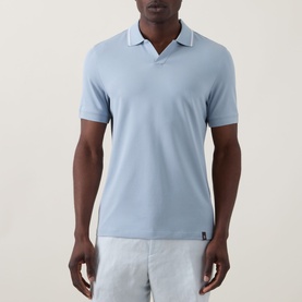 Model wearing Boggi Milano S-Caf&eacute;&reg; Logo Piqu&eacute; Polo Shirt in light blue with tipped collar and V-neckline, styled with grey shorts.