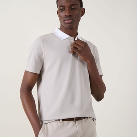 Model wearing Boggi Milano S-Caf&eacute;&reg; Piqu&eacute; Polo Shirt in sand with white contrast tipped collar, two-button placket and short sleeves