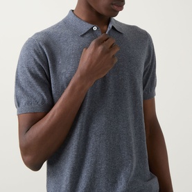 Model wearing Boggi Milano Solid Polo Shirt in indigo linen-cotton, with polo collar, button fastenings and short sleeves.