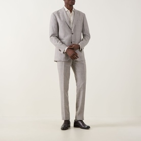 Model wearing Boggi Milano Micro Patterned Two-Piece Suit in brown linen-wool blend, single-breasted jacket, styled with white shirt and dark Oxford