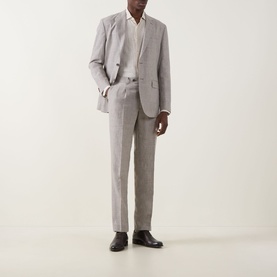 Model wearing Boggi Milano Micro Patterned Two-Piece Suit in brown linen-wool blend, styled with white shirt and dark leather shoes.