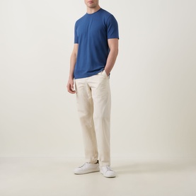 Model wearing Boggi Milano Caf&eacute; Piqu&eacute; Logo T-Shirt in Air Blue with crew neck, styled with cream trousers and white trainers.