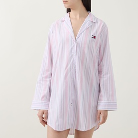 Model wearing Tommy Hilfiger Flag Stripe Night Dress in Classic Pink Multi Stripe, long sleeves, notched lapels, short length with curved hem.