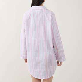 Model wearing Tommy Hilfiger Flag Stripe Night Dress in Classic Pink Multi Stripe, back view, showing long sleeves and short length