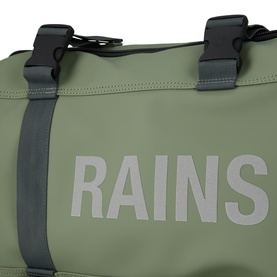 Rains duffle bag in sage green waterproof fabric with black buckle hardware and embossed logo lettering, close-up detail shot