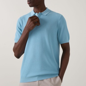 Model wearing Bugatti Structure Polo Shirt in aqua, featuring flat collar, button fastening, short sleeves and ribbed trims, styled with light