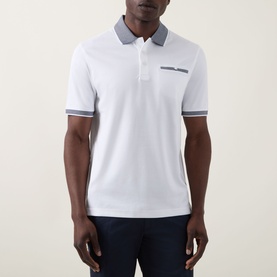 Model wearing Bugatti Contrast Collar Polo Shirt in white with grey contrast collar, cuffs, chest pocket, and three-button placket.