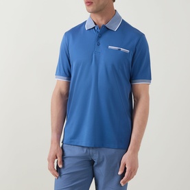 Model wearing Bugatti Tipped Logo Polo Shirt in dark blue with contrast tipped collar, cuffs, and chest pocket with button fastening.