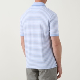 Model wearing Bugatti Stripe Logo Polo Shirt in light blue, rear view showing stripe pattern, flat collar, short sleeves and straight hemline.