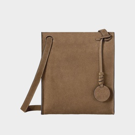 Mulberry Soft Mini Tote Bag in beige suede leather with knotted charm fob, adjustable crossbody strap, clean square silhouette