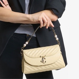 Curve Quilted Top Handle Bag